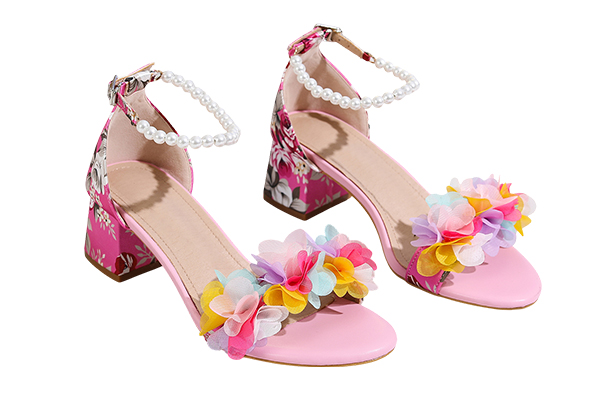 What kind of visual effect does pearl decoration have on women's high heel sandals?