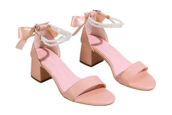 How do pink high heel sandals cleverly combine fashion and comfort?